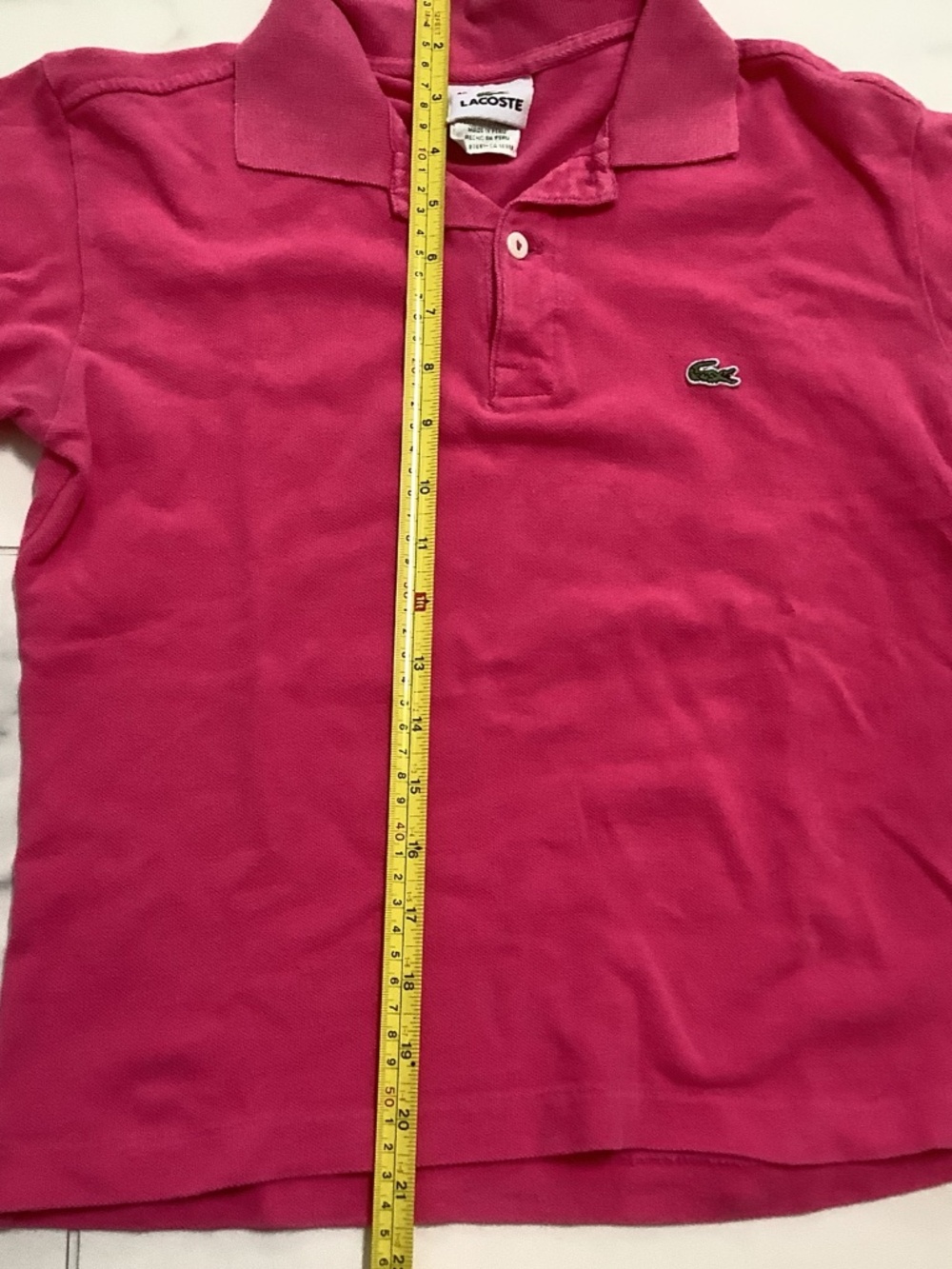 Women’s Lacoste polo top